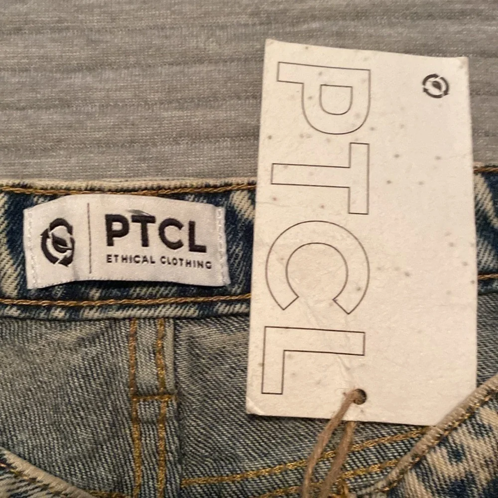 PTCL ethically friendly Indigo Tint Washed Button Fly  jean shorts size 27